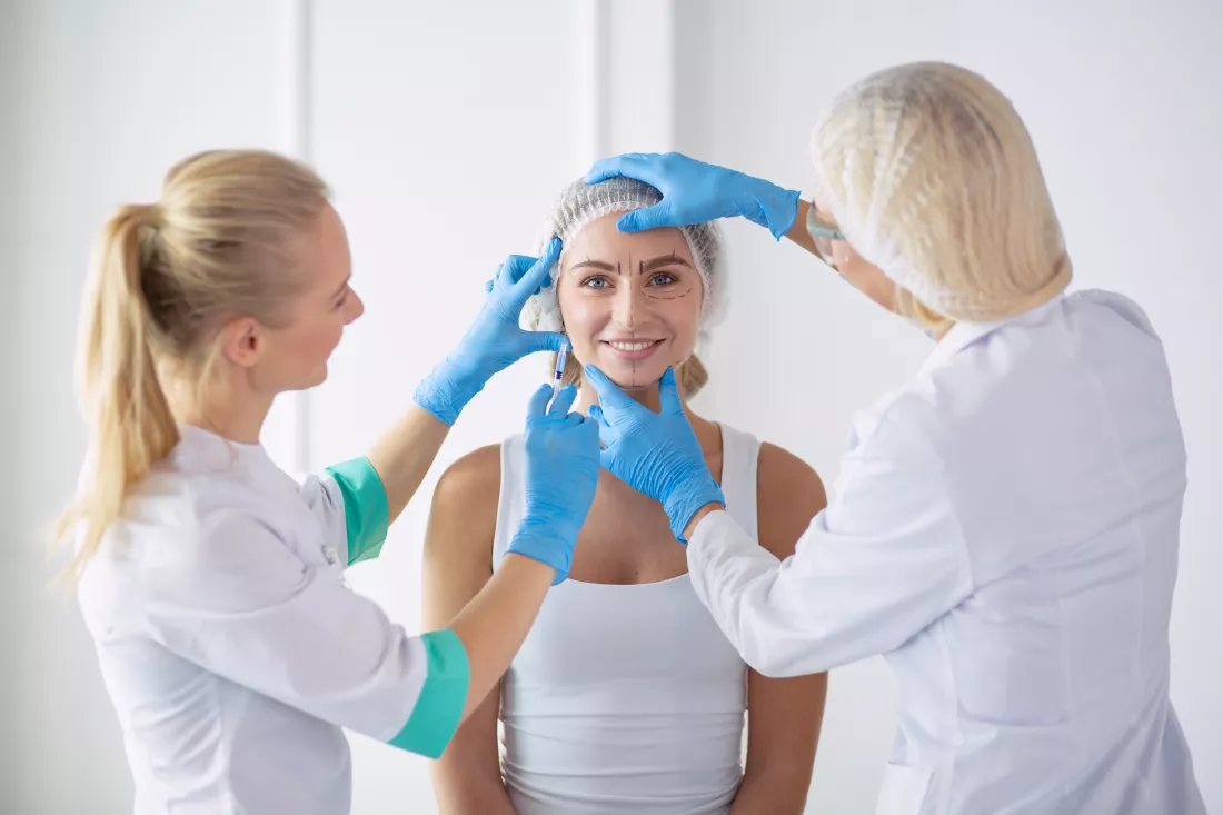 beautiful-woman-face-near-doctor-with-syringe